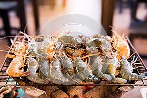 Grilled shrimp and crab on the flaming grill