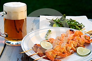 Grilled shrimps and beer