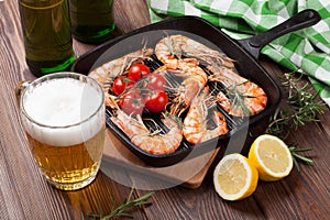 Grilled shrimps and beer