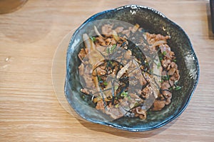 Grilled slice pork on rice bowl in Japanese style butadon