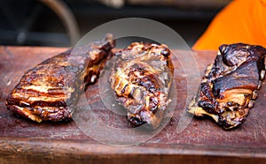 Grilled spare beef or pork back ribs prepared in smoker.