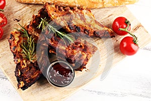 Grilled spare ribs for a tasty bbq meat with hot spicy barbecue sauce