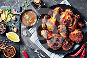 Grilled spicy Jerk Chicken drumsticks and thighs