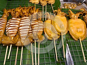 grilled squid in the market