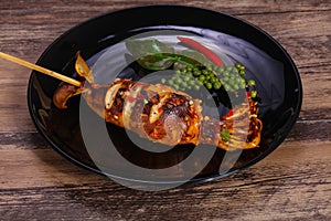 Grilled squid with sauce and hebs