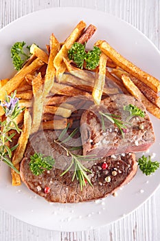 Grilled steak and french fries