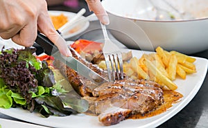 Grilled steak, French fries and vegetables