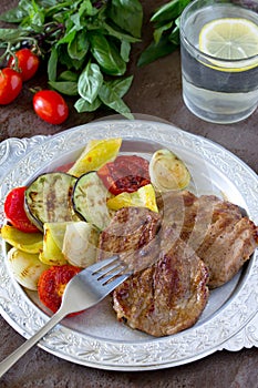 Grilled steak meat pork and grilled vegetables