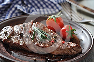 Grilled steak on plate