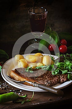 Grilled steak with potatoes