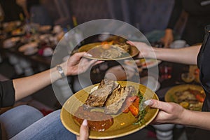 Grilled Steak Striploin and Pepper sauce on cutting board on dark wooden background.