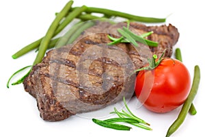 Grilled steak with tomato and green beans,isolated