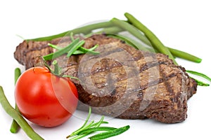 Grilled steak with tomato and green beans,isolated