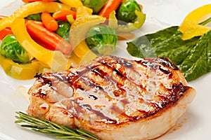 Grilled steak with vegetables photo