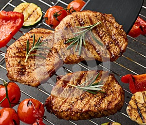 grilled steaks and vegetables