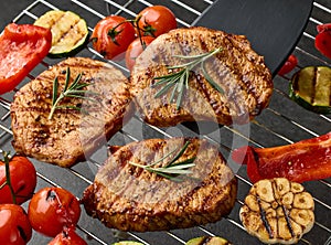 grilled steaks and vegetables