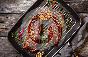 Grilled strip steak with spices