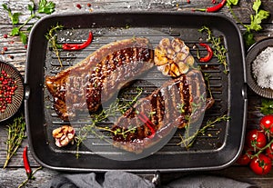 Grilled strip steak with spices