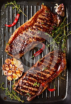 Grilled strip steak with spices