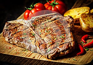 Grilled T-bone steak with vegetables