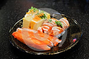 Grilled toro salmon sushi sake nigiri and mayonnaise. photo
