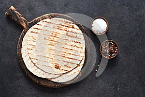 Grilled tortilla with spices. Mexican flatbread - tortilla