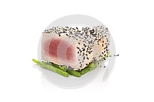 Grilled tuna steak on white.