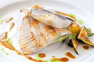 Grilled turbot fish with vegetables. photo