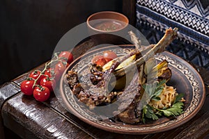 Grilled veal ribs with vegetables