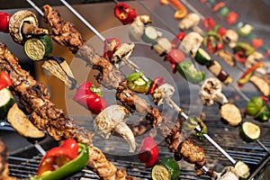 Grilled vegetable and meat skewers