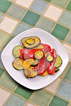Grilled vegetables on dining table