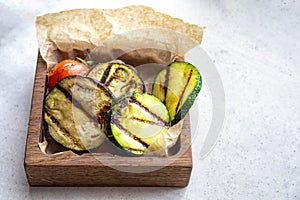 grilled vegetables in a fansy wooden plate