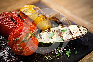 Grilled vegetables on a stone board