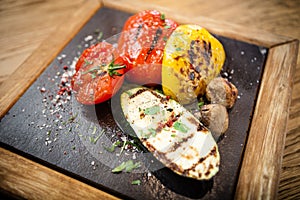 Grilled vegetables on a stone board