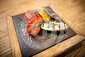 Grilled vegetables on a stone board