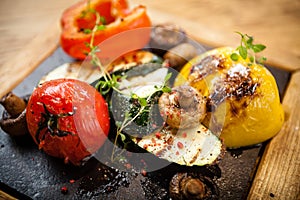 Grilled vegetables on a stone board