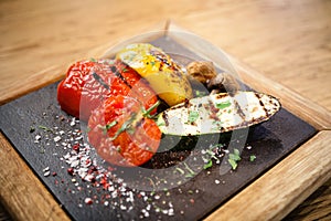 Grilled vegetables on a stone board