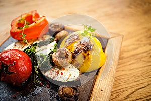 Grilled vegetables on a stone board