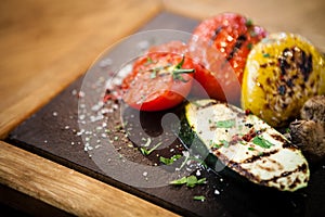 Grilled vegetables on a stone board