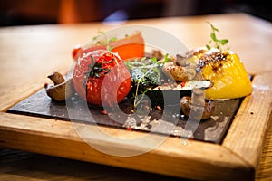 Grilled vegetables on a stone board