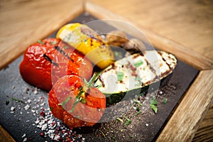 Grilled vegetables on a stone board