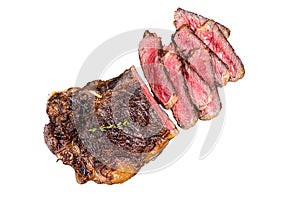 Grilled Wagyu Striploin beef meat steak or new york steak in a steel tray. Isolated, white background.