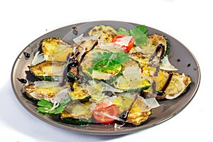 Grilled zucchini with olive oil, parmesan and balsamico