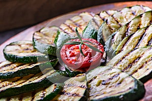 Grilled Zucchini Tomato with chili pepper. Italian mediterranean or greek cuisine. Vegan vegetarian food