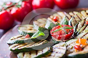 Grilled Zucchini Tomato with chili pepper. Italian mediterranean or greek cuisine. Vegan vegetarian food