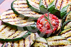 Grilled Zucchini Tomato with chili pepper. Italian mediterranean or greek cuisine. Vegan vegetarian food