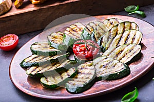 Grilled Zucchini Tomato with chili pepper. Italian mediterranean or greek cuisine. Vegan vegetarian food