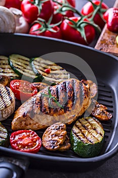 Grilled Zucchini Tomato with chili pepper. Italian mediterranean or greek cuisine. Vegan vegetarian food