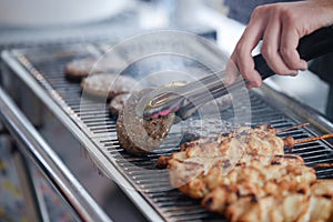 Grilling burgers and chicken skewers