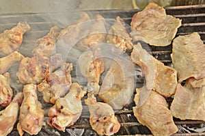 Grilling chicken on fire